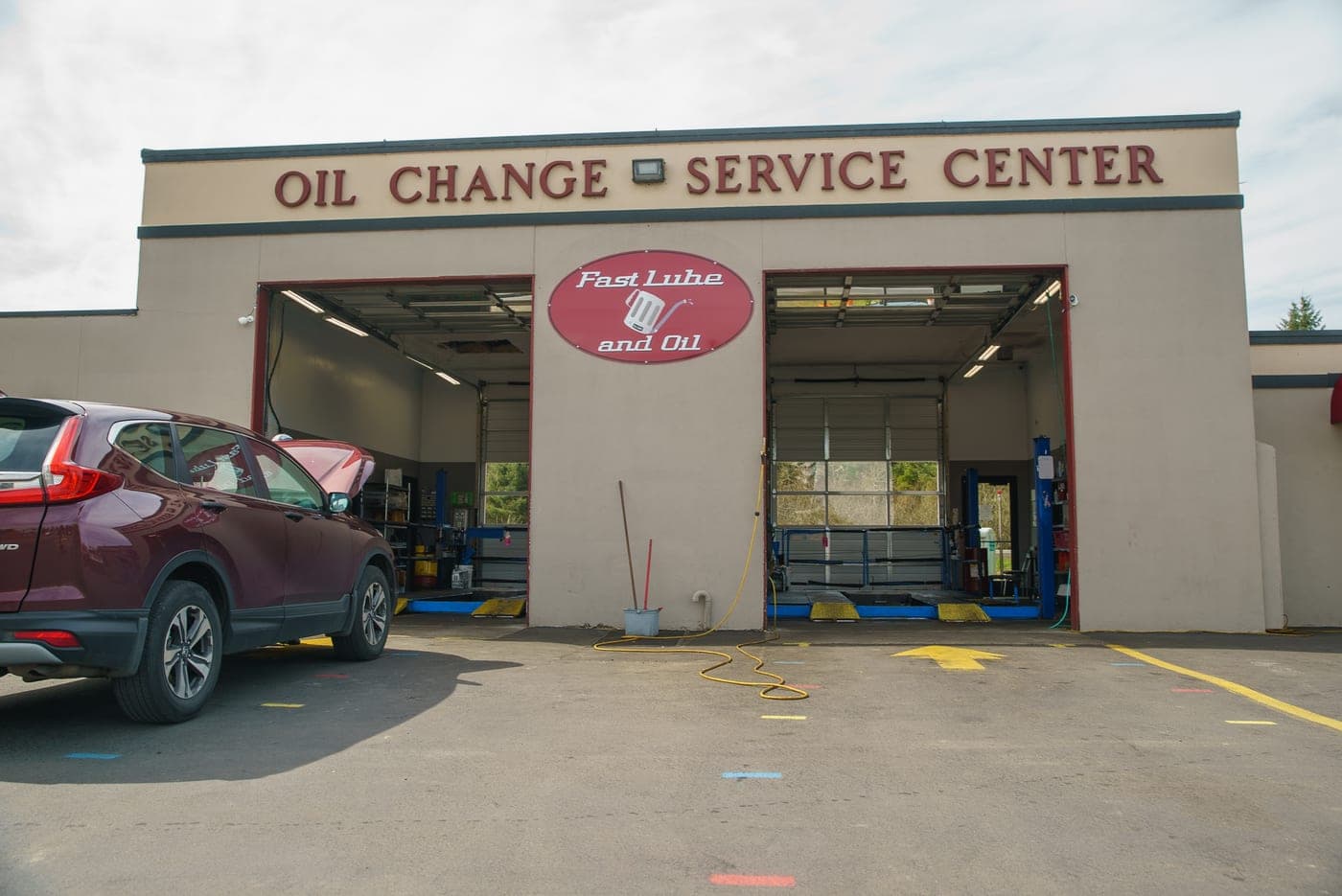 A vehicle being serviced in the Warrenton drive-through bays
